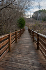 Obraz premium Bridge crossing near the Tega Cay golf course off of the Trailhead Park hiking trail in Tega Cay, South Carolina. 