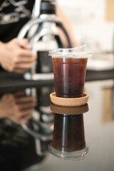 Iced americano coffee on tray