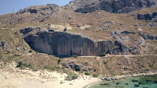 Drone shot of Plakias Main Cliff overlooking the Mediterranean Sea in Plakias village, Crete island