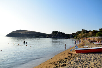Fototapeta na wymiar calm sea at sunset - Paralia Richa Nera (beach), Myrina, Lemnos island, Greece, Aegean sea