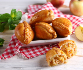 homemade mini pies with filling for snacks © Olga Kriger