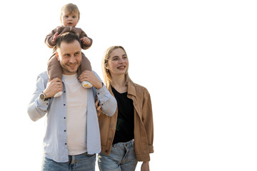 A young family, a woman and a man, happy positive parents and a child, in stylish clothes together....