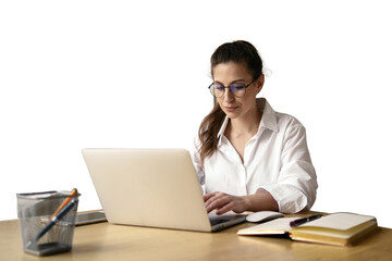 A female freelance marketer for online work uses a laptop, sits at a desk in the office.