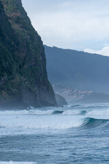 Coast line cliffs of madeira with strong waves