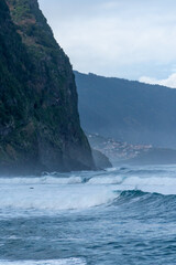 Fototapeta na wymiar Coast line cliffs of madeira with strong waves