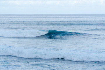 Coast line cliffs of madeira with strong waves