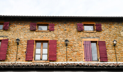 Window of old village stone house in France