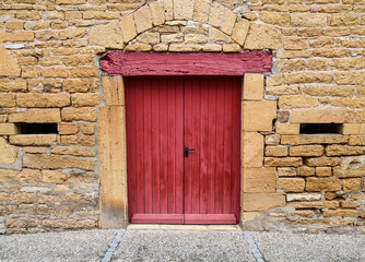 Old wooden red entry door