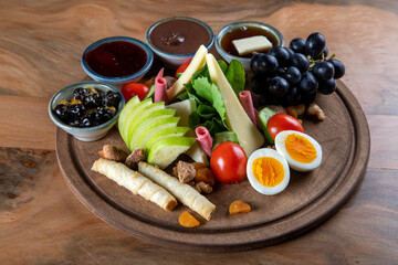 Traditional Turkish breakfast on wooden plates,top view