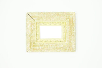 The frame is light, silver, the frame is white with gold edging on a white background.
