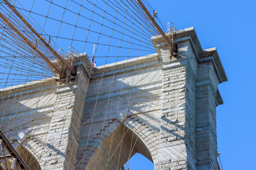 An awesome architectural detail scenery view of Brooklyn Bridge, located in New York City, United...