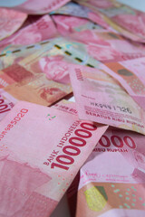 Indonesian rupiah banknotes series with the value of one hundred thousand rupiah IDR 100,000 issued...