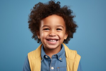 a professional portrait studio photo of a cute boy child model with perfect clean teeth laughing and smiling. isolated on white background. for ads and web design