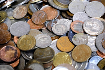 Indian Old vintage coins, vintage coin abstract with English & Indian coins in forefront.