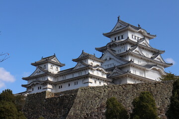 Himeji Castle and clear blue sky viewed from Sangokubori (Moat) in Himeji, Japan