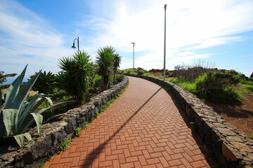Paved walkway leading to the Cape of Garajau in Caniço near Funchal on Madeira Island (Portugal)...