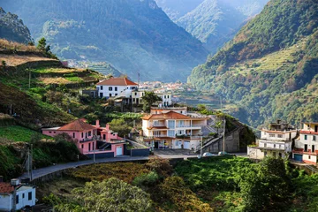 Papier Peint photo Atlantic Ocean Road Hillside traditional houses in Boaventura, a village in a valley of the north coast of Madeira island (Portugal) in the Atlantic Ocean