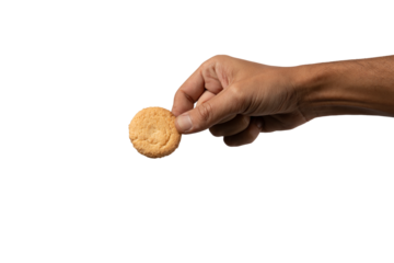 black male hand holding a biscuit or cookie isolated no background