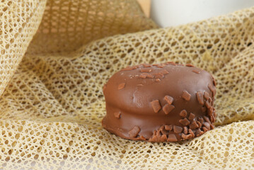 chocolate bonbon with dulce de leche delicious caramel sugar filling isolated caloric