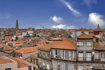 Naklejka na ściany i meble An overview of the beautiful Portuguese city of Porto with its characteristic multicolored houses
