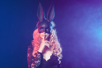 sexy portrait of a bunny girl. a girl with white hair wearing a black hare mask.