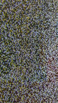 Close up view at a plasma tv while showing noise activity.