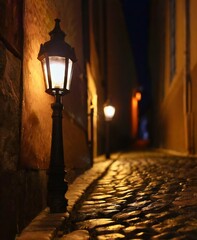 Narrow cobbled dark lantern street