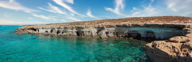 Fototapeta na wymiar Famous sea caves near Ayia Napa on the island of Cyprus. The coast of the Mediterranean.
