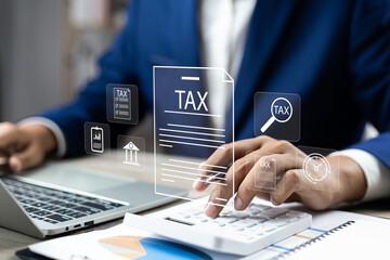 Tax and Vat concept. Government, state taxes concept. Businesman using calculator and laptop to complete Individual income tax return form online for tax payment. Data analysis, financial research. - obrazy, fototapety, plakaty