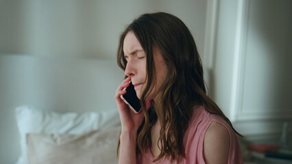 Upset woman answering mobile phone at night closeup. Unhappy sad girl crying