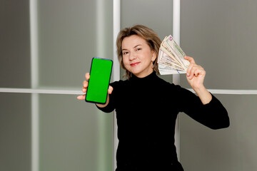 happy woman with money in hands and phone with green screen, SHOTLISTbanking,