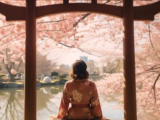 Foto op Plexiglas 桜並木と女性のうしろ姿　桜満開　観光　旅行 © ZUNTA