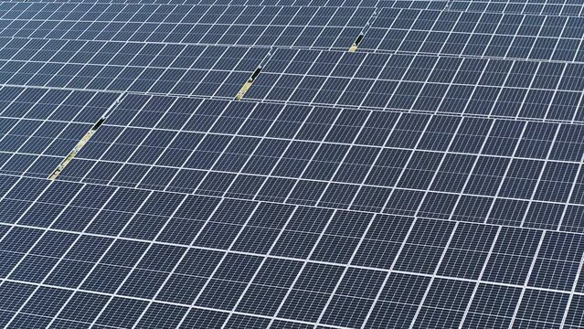 Drone shot of solar panels in Germany. Drone move to the right.