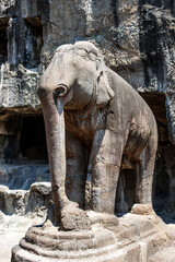 Fototapeta premium Big stone elephant statue inside of cave 32, a Jain temple in Ellora, Maharashtra, India, Asia