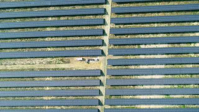Top down drone Shot of solar panels. Drone looks 90 degrees downwards