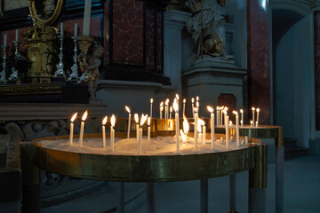 candles in church of st nicholas
