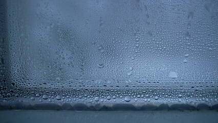 Condensation on Cold Window Glass, Winter Droplets Close-up