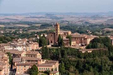 Fototapeta na wymiar Aerial view of the Basilica San Francesco in Siena, seen from the Facciatone panoramic viewpoint