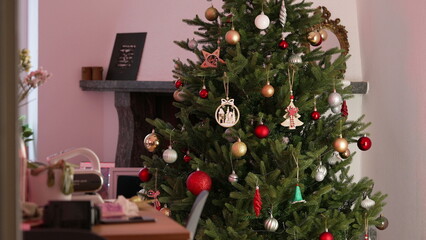 Decorated Christmas Tree During December Holidays - Celebration of Tradition in living room home