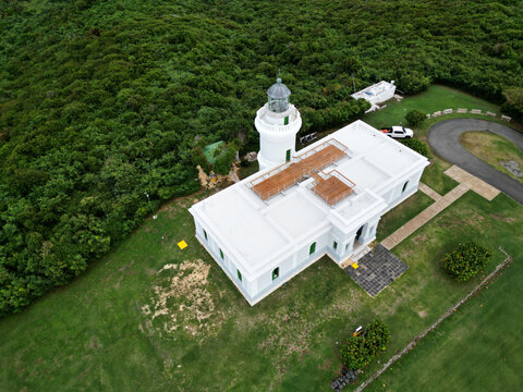 fajardo lighthouse aerial photo (drone shot of famous light house landmark on coast puerto rico) beach, sea, cabezas national park, caribbean sea (from above, looking down, ocean waves) scenic travel