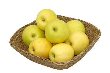 Golden delicious apples in a basket bowl