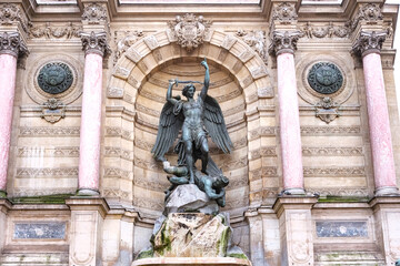 Statue of the archangel Saint Michel subduing the Devil is the work of Francisque Duret, built in...