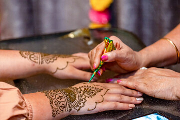 Indian bride's henna mehendi mehndi hands close up