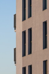 Newly built block of flats. Modern generic architecture. New home building and living concept....