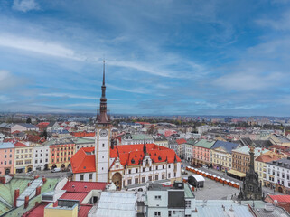 Fototapeta na wymiar Olomouc, Czech Republic April 20, 2022: Top view of the Old town, town hall and Holy Trinity Column in Olomouc, Czech Republic