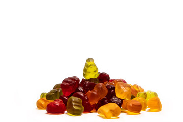 A bunch of colorful gummy candies on white background