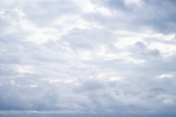 Blue cloudy sky, blue white background, sky before rain, winter storm brews