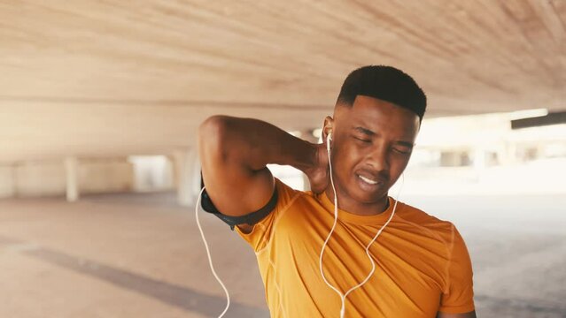 Black man, neck pain and exercise outdoor, burnout or spine injury with earphones for workout and muscle tension. Ache, fibromyalgia and fitness mistake with music, accident and inflammation of joint