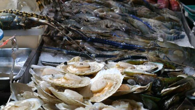 Seafood stall at Bangkok's Chinatown. Bangkok's Chinatown. It is one of the world's largest and most renowned street food destinations. It is famous for amazing street food, lively dining.