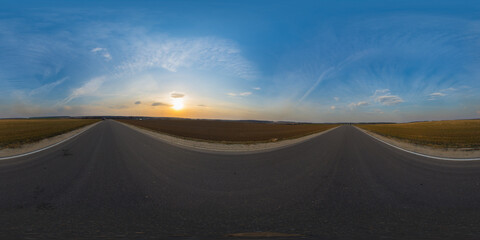 360 degree spherical panorama on country asphalt road among fields at sunset or sunrise with beautiful sky and cirrus clouds. VR content. - obrazy, fototapety, plakaty